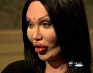 Pete Burns, lead singer of Dead or Alive sporting a natural evening "look".