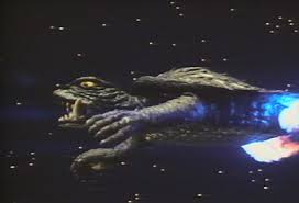 PROF. de VROOME: "As you can see, Gamera is headed straight for earth and he means business. Giant Space Turtles are actually more dangerous even than Giant Space Penguins. Few people know that, but it's true. I would not lie about such things. Lucky for Earth these Giant Space Turtles always seem to hit Japan and then bounce away, for some reason. We don't know why. Still, it's not good. I understand that Japanese teenagers are pretty busy licking each other's eyeballs these days, when they should really get busy and start to lick the lenses of Japanese telescopes. Send these eyeball-lickers to the planetariums of Japan where their busy pink tongues will useful to their country! Lick the telescopes like your tongues are swift as hummingbird wings, you demented Japanese children! Gamera is on his way. I would not lie about such things."